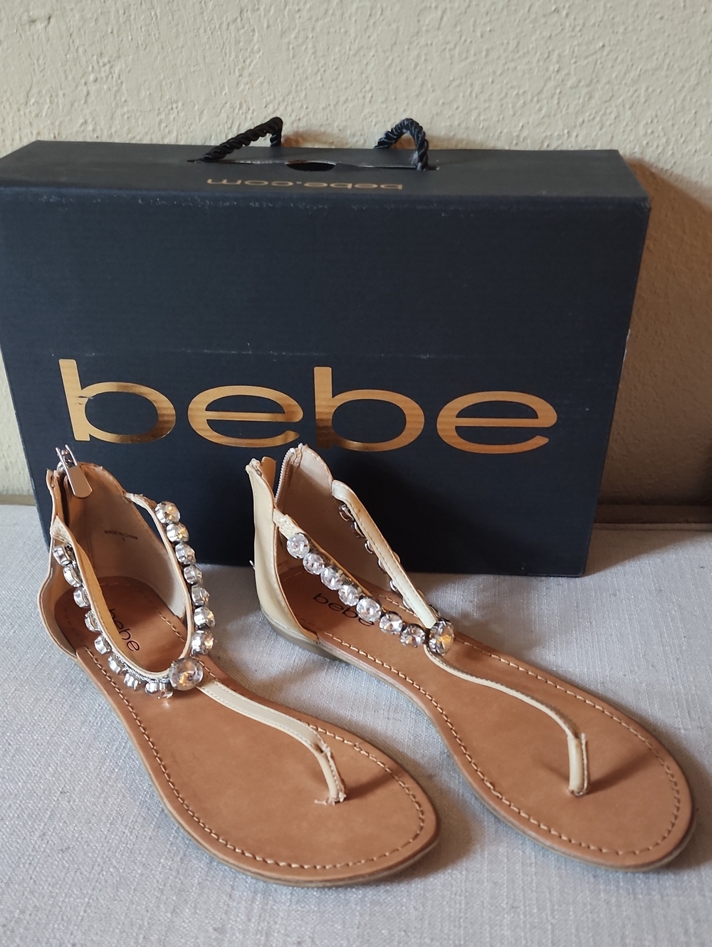 bebe Tan T-Strap Sandals with Crystal Accents